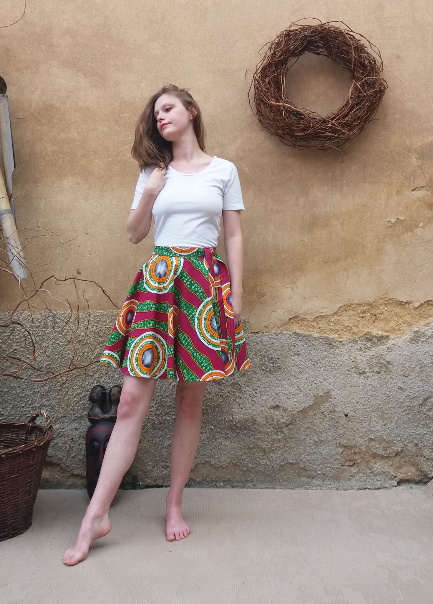 Krátká, zavinovací kolová sukně - Africa kola na zelené