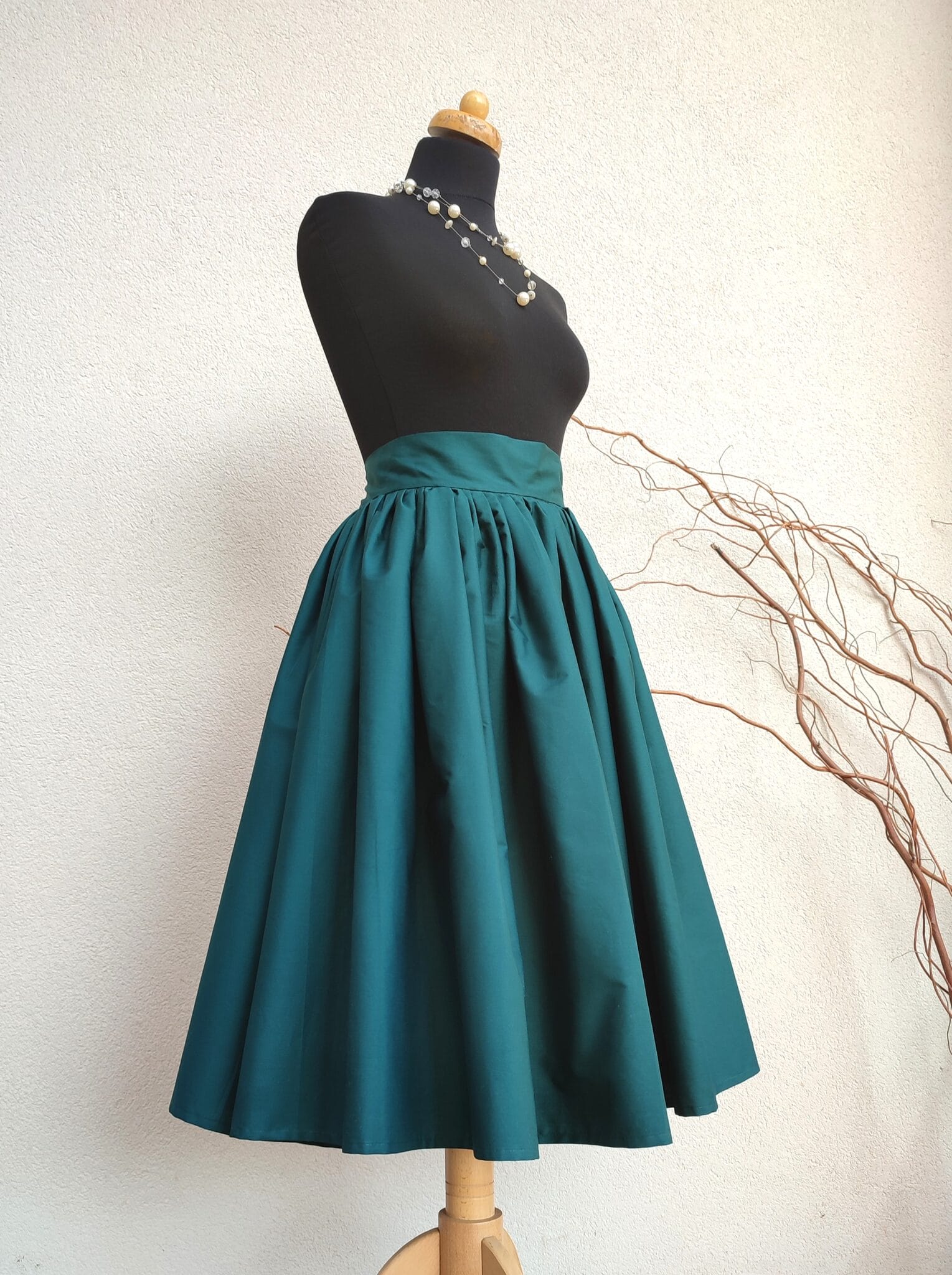 Midi smaragdová sukně - zip